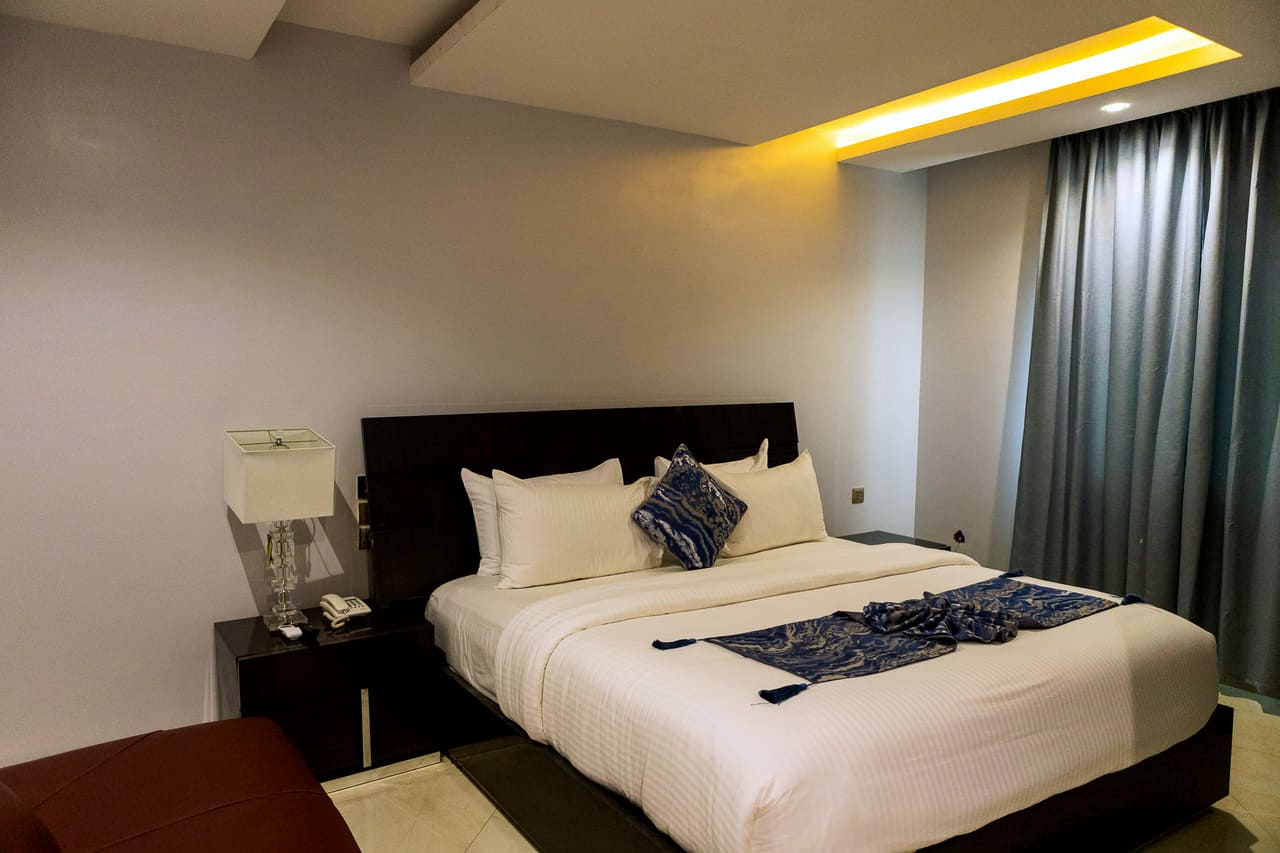 King bed in the 2 Bedroom Deluxe Suite